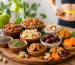 Assorted healthy dry fruits including almonds, walnuts, pistachios, cashews, dates, raisins, and dried apricots for healthy weight loss.